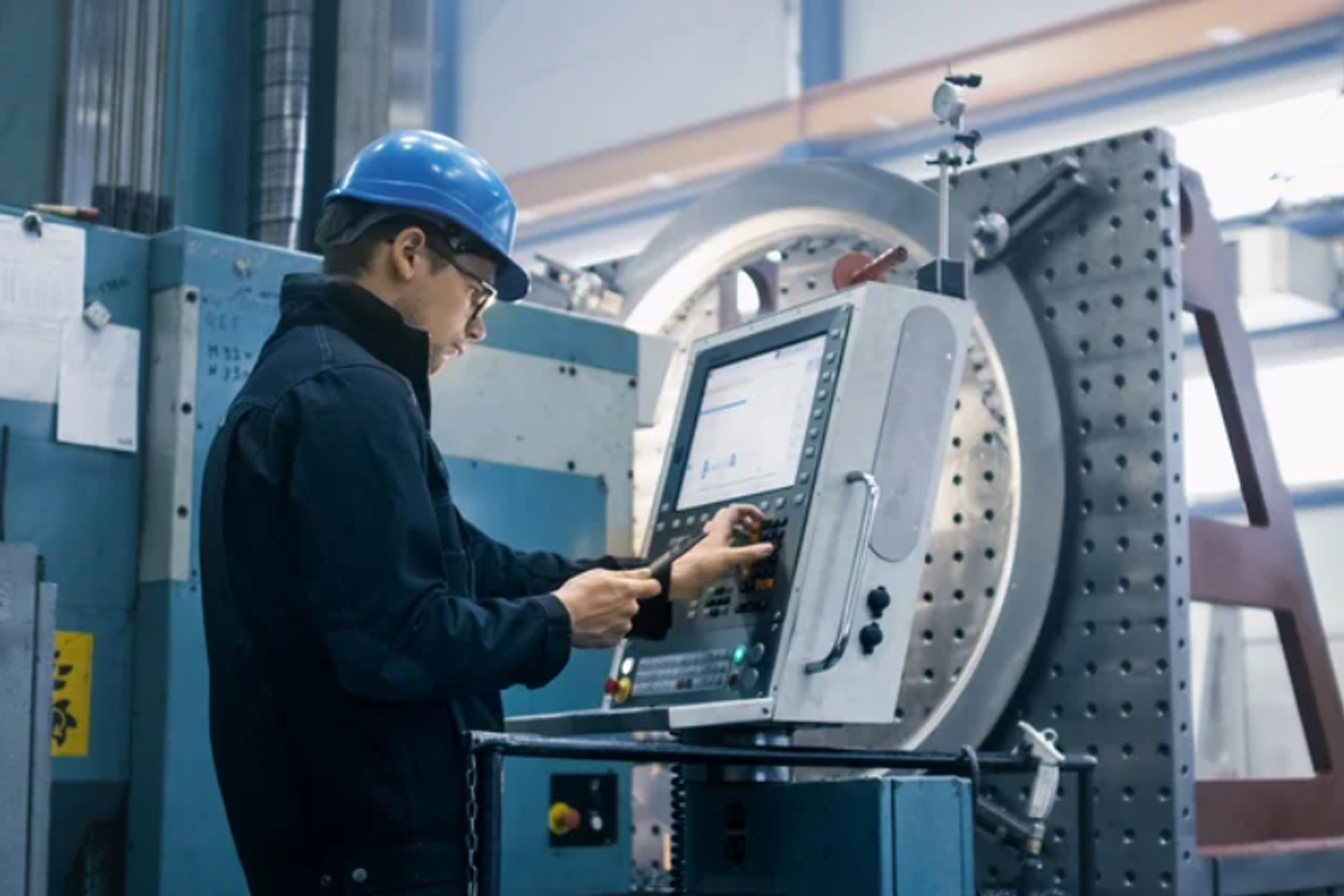 Worker using tool